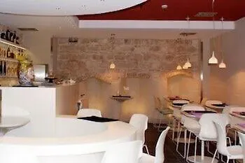 El Homs Palace Hotel Комизо